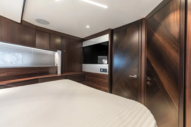 Slide: The Image of Luxurious interior of 2023 Sunseeker Manhattan 55 yacht with elegant wood finishes. - 54