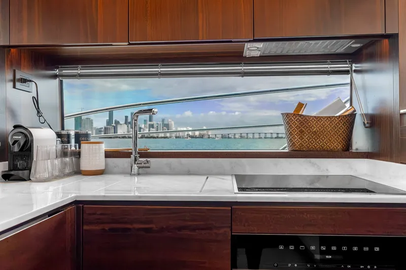 Slide: The Image of Luxurious kitchen interior of 2023 Sunseeker Manhattan 55 yacht with ocean view. - 28