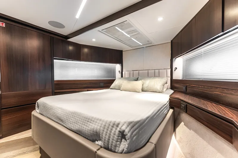 Slide: The Image of Luxurious bedroom interior of 2023 Sunseeker Manhattan 55 yacht with modern design and elegant finishes. - 53