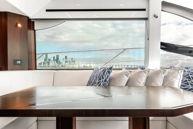 Slide: The Image of Luxurious interior of 2023 Sunseeker Manhattan 55 yacht with city skyline view. - 24