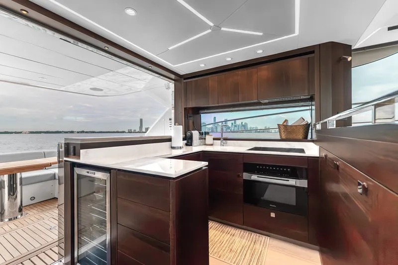 Slide: The Image of Luxurious kitchen interior of 2023 Sunseeker Manhattan 55 yacht with modern appliances and ocean view. - 31