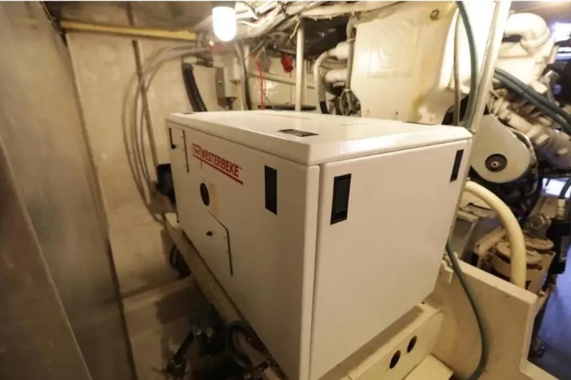 Slide: The Image of Engine room of 1985 Bertram 54 Convertible with Westerbeke generator. - 28
