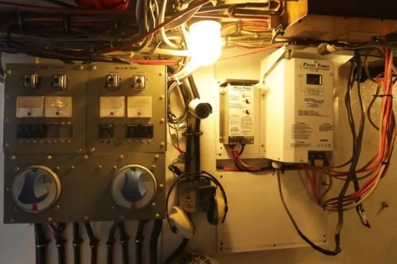 Slide: The Image of Electrical panel and wiring inside a 1985 Bertram 54 Convertible boat. - 29