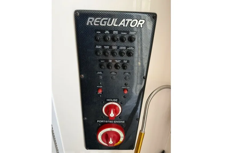 Slide: The Image of Circuit breaker panel under console - 13