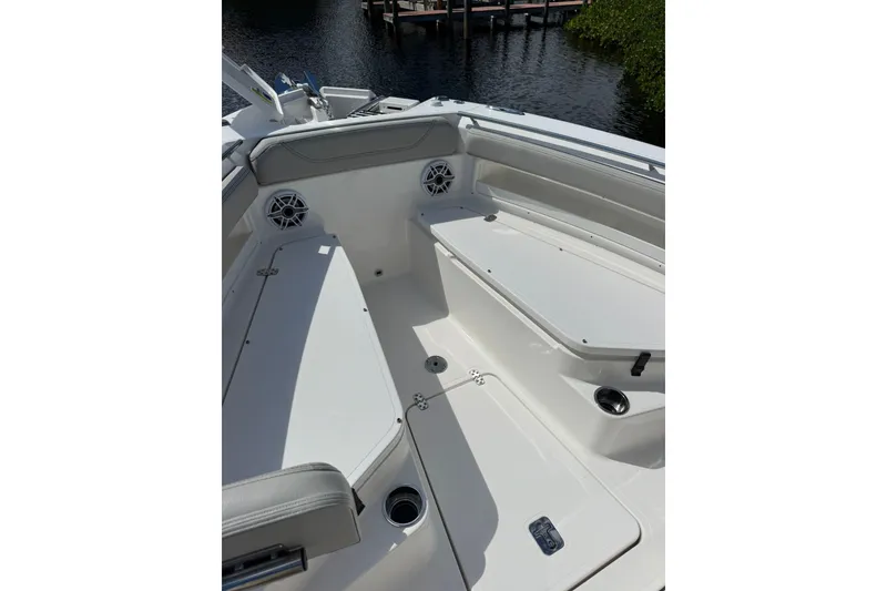 Slide: The Image of 2023 Pursuit S 248 Sport boat interior with seating and speakers. - 14