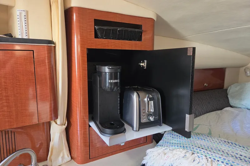 Slide: The Image of Coffee maker and toaster in 2005 Sea Ray Sundancer 320 cabin kitchen. - 27