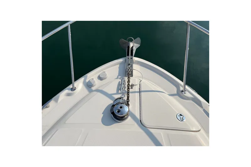 Slide: The Image of Bow of 2005 Sea Ray Sundancer 320 with anchor and chain mechanism. - 5