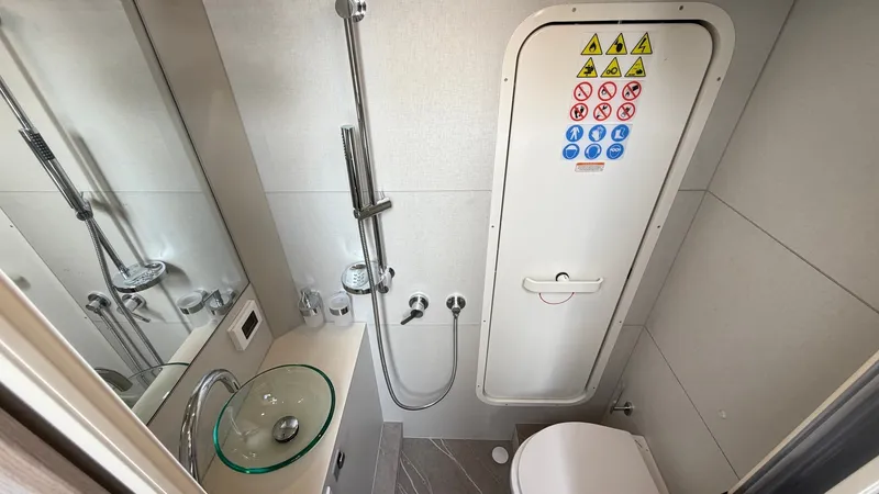 Slide: The Image of Compact Ensuite Bathroom with Shower - 51