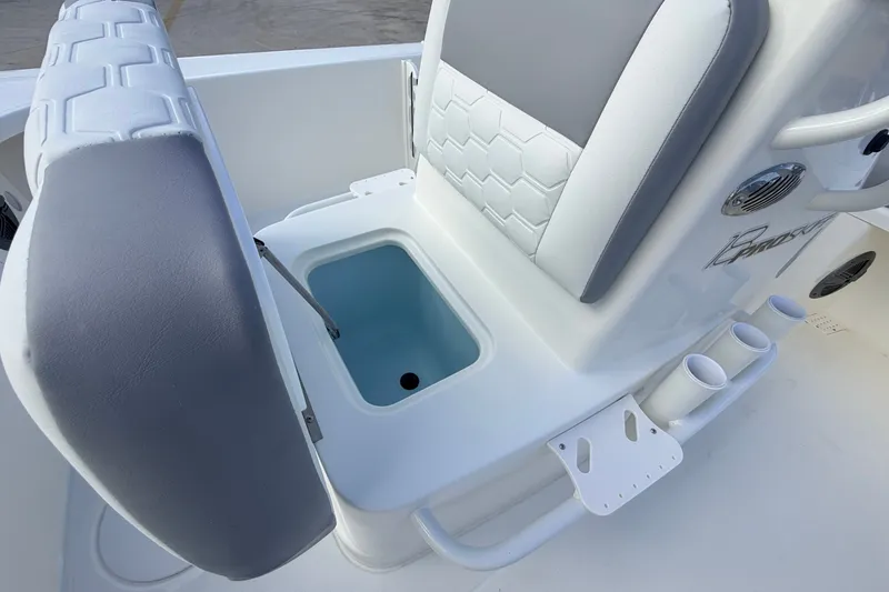 Slide: The Image of 2026 Mako 18 Pro Skiff boat seat with integrated storage compartment. - 12