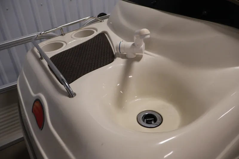 Slide: The Image of Sink and cup holders on 2008 Sun Tracker Fishin' Barge 21 boat. - 14