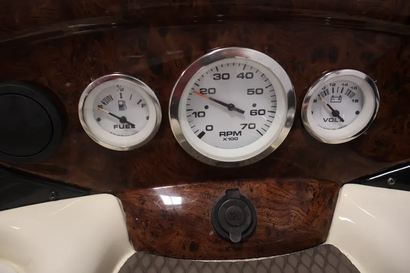 Slide: The Image of Dashboard gauges of a 2008 Sun Tracker Fishin' Barge 21 boat. - 17