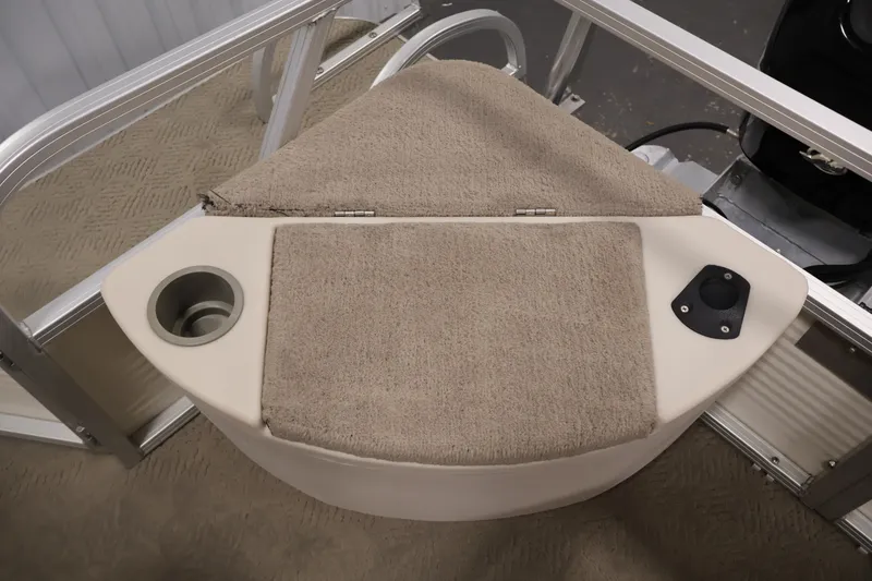 Slide: The Image of 2008 Sun Tracker Fishin' Barge 21 boat interior with carpeted seating and cup holder. - 31