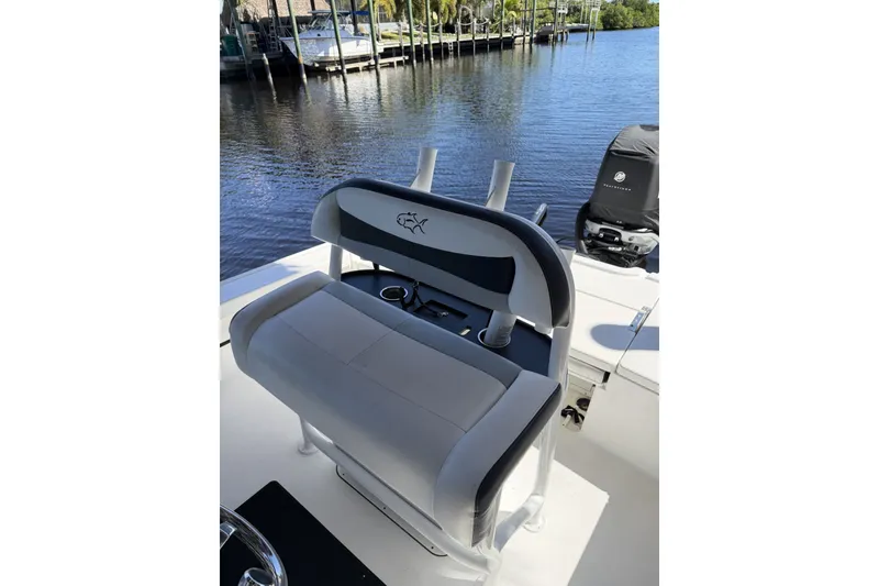Slide: The Image of 2015 Crevalle 24 Bay boat interior with seating and water view. - 43