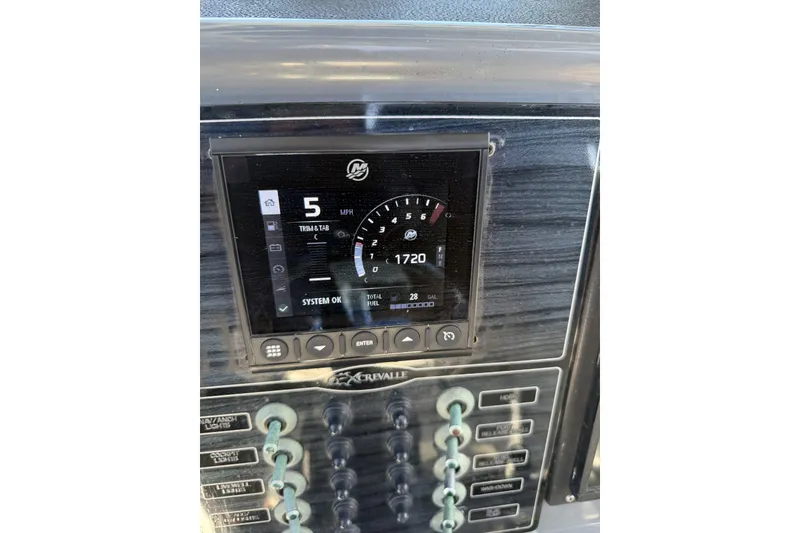 Slide: The Image of Dashboard of a 2015 Crevalle 24 Bay boat showing speed and system status. - 24