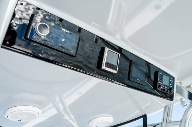 Slide: The Image of Valhalla V-33 2025 boat dashboard with modern navigation and audio controls. - 27