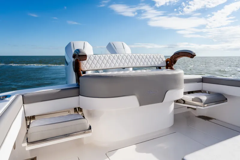 Slide: The Image of Luxury seating on 2025 Valhalla V-33 boat with ocean backdrop. - 31
