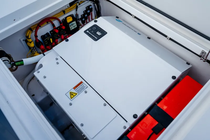 Slide: The Image of 2025 Valhalla V-33 electrical system with wiring and battery components. - 35