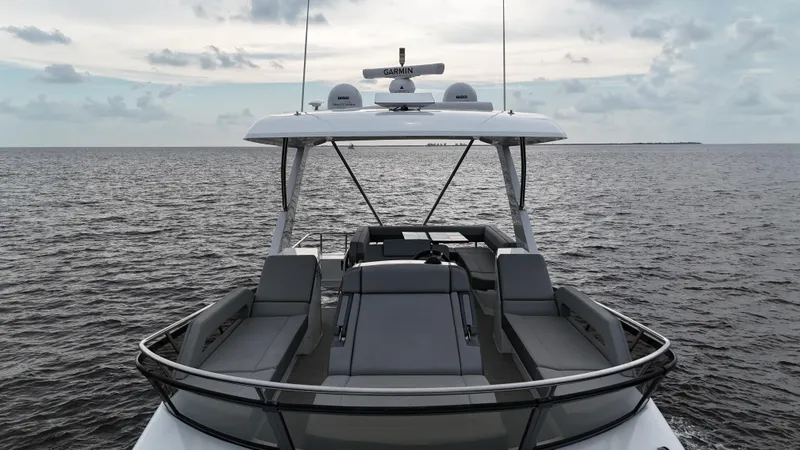 Slide: The Image of 2021 Cruisers Yachts 60 Cantius Flybridge on open water, showcasing sleek design and luxury. - 45