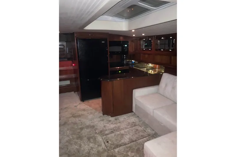 Slide: The Image of Luxurious interior of 2009 Custom Thomas 50 Dutch Barge with modern kitchen and cozy seating. - 4