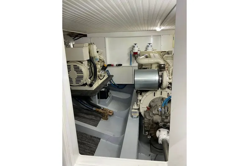 Slide: The Image of Engine room of 2009 Custom Thomas 50 Dutch Barge, showcasing machinery and components. - 8