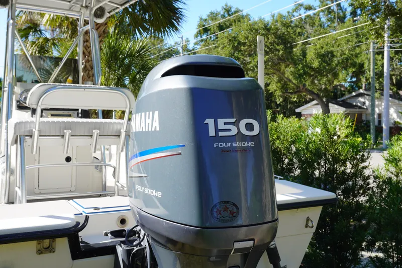 Slide: The Image of Yamaha 150 four-stroke outboard motor on a 2000 Pathfinder 2200 V boat. - 3