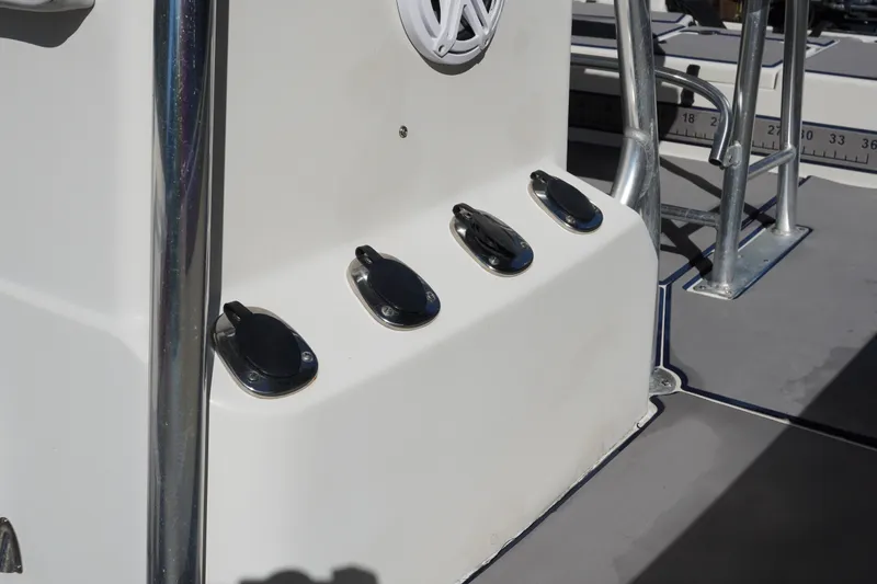 Slide: The Image of Close-up of a 2000 Pathfinder 2200 V boat's deck fittings and railing. - 19