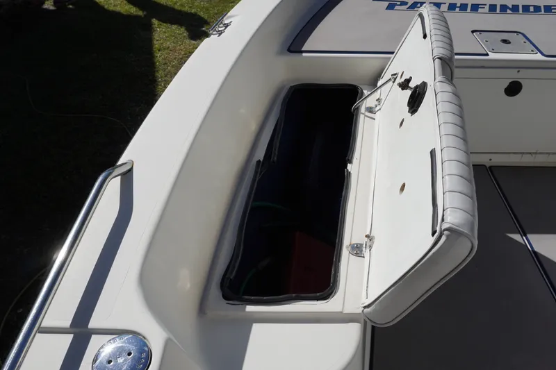 Slide: The Image of Open storage compartment on a 2000 Pathfinder 2200 V boat. - 15