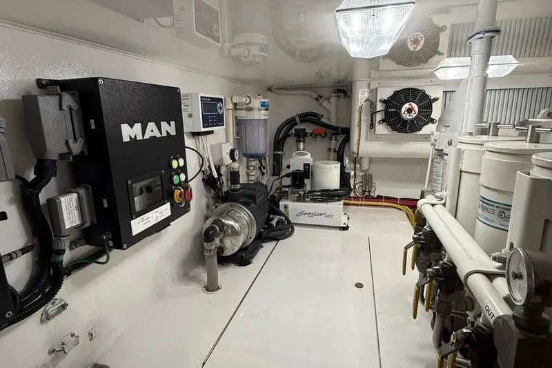 Slide: The Image of Engine room of 2018 Viking 52 Convertible yacht with MAN equipment and filtration systems. - 24