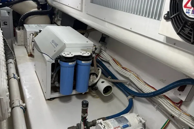 Slide: The Image of Engine room of 2018 Viking 52 Convertible yacht with water filtration system. - 20
