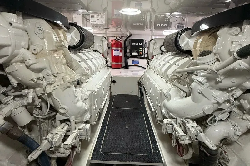 Slide: The Image of Engine room of 2018 Viking 52 Convertible yacht with dual MAN engines. - 21