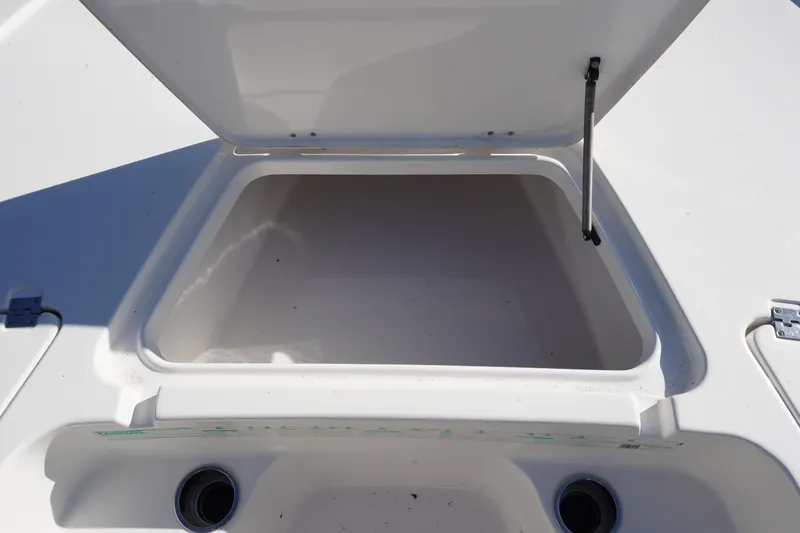 Slide: The Image of Open storage compartment on 2016 Tidewater 1910 Bay Max boat. - 19