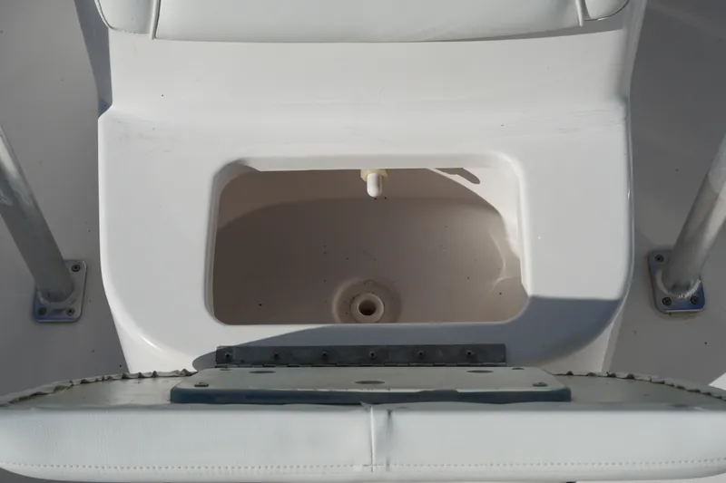 Slide: The Image of 2016 Tidewater 1910 Bay Max boat interior with storage compartment. - 21