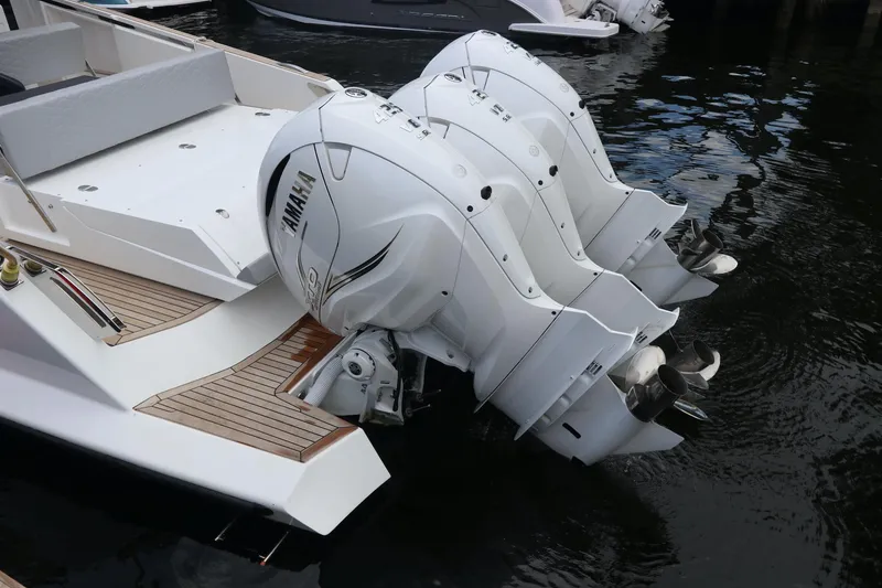 Slide: The Image of 2024 Astondoa 377 Coupe Outboard with twin Yamaha engines on water. - 34