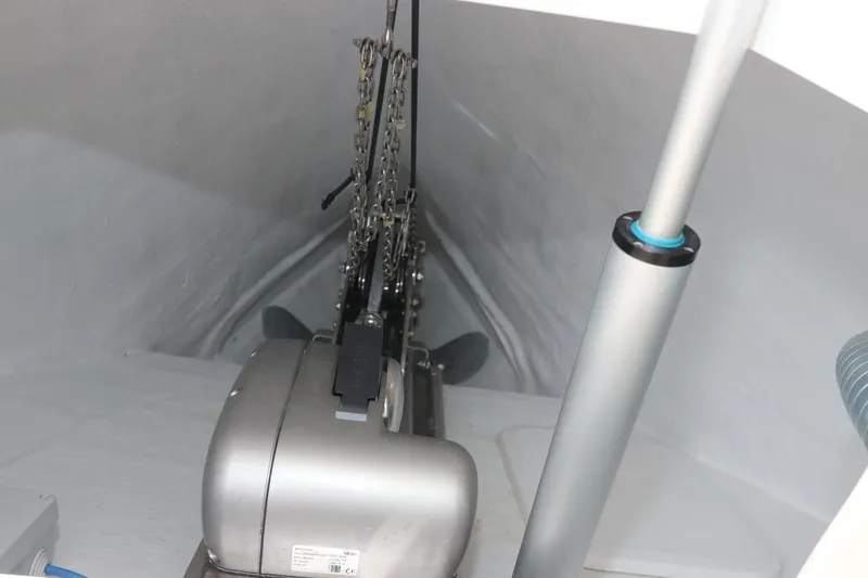 Slide: The Image of 2024 Astondoa 377 Coupe Outboard anchor chain mechanism in storage compartment. - 14