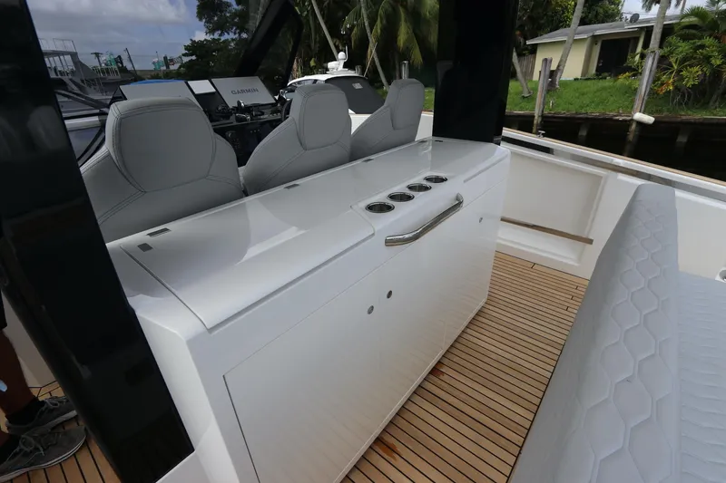 Slide: The Image of Astondoa 377 Coupe Outboard 2024 interior with sleek seating and modern design. - 25