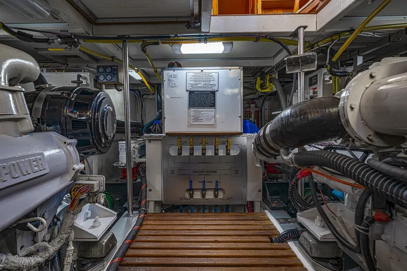 Slide: The Image of Engine room of 2002 Grand Banks 46 Classic yacht, showcasing machinery and equipment. - 35