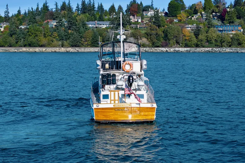 Slide: The Image of Grand Banks 46 Classic yacht cruising on a scenic lake, 2002 model. - 3