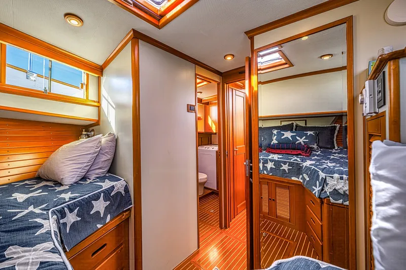 Slide: The Image of Interior of 2002 Grand Banks 46 Classic yacht with cozy twin and double beds. - 18