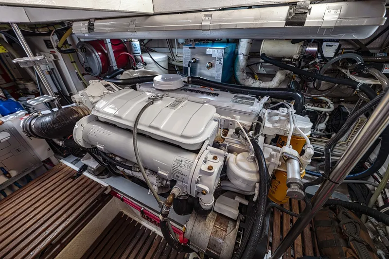 Slide: The Image of Engine room of 2002 Grand Banks 46 Classic yacht, showcasing detailed machinery and components. - 31
