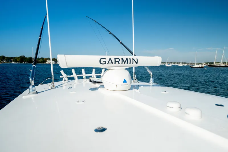 Slide: The Image of The boat is a 2022 Regulator 34 CC with Garmin equipment on the deck. - 20