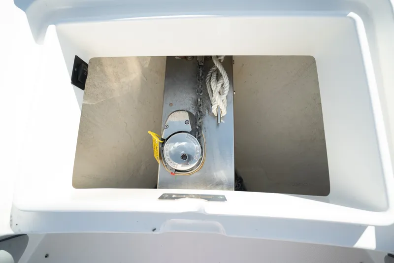 Slide: The Image of Anchor locker with chain and rope on a Regulator 34 CC boat. - 14