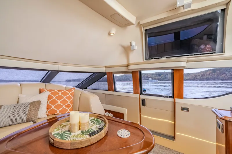 Slide: The Image of Luxurious interior of 2006 Carver 56 Voyager yacht with scenic water view. - 44