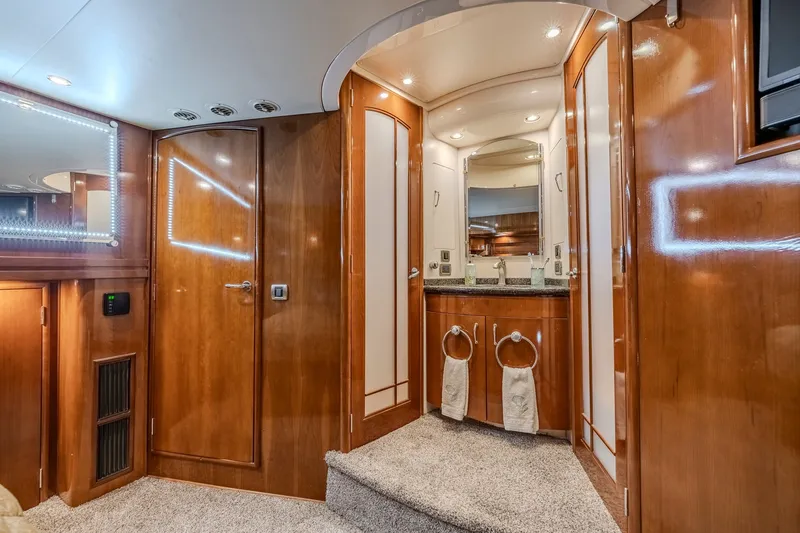 Slide: The Image of Luxurious interior of 2006 Carver 56 Voyager yacht with elegant wood finishes and modern amenities. - 55