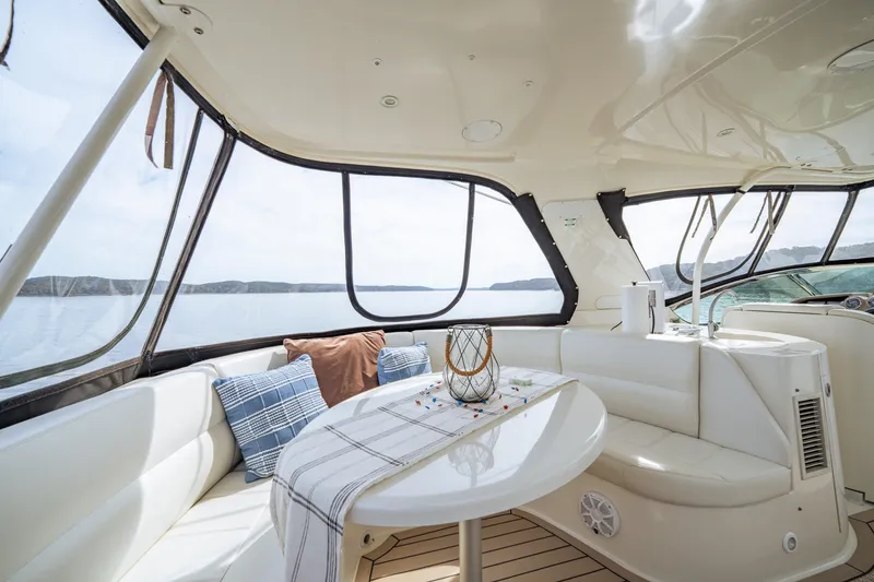 Slide: The Image of Luxurious interior of 2006 Carver 56 Voyager yacht with scenic water view. - 49