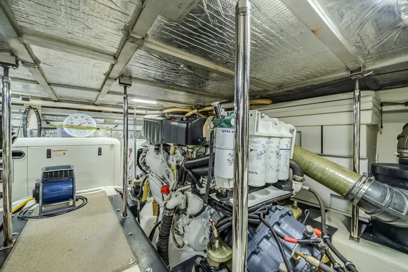 Slide: The Image of Engine room of 2006 Carver 56 Voyager yacht with Volvo components and insulation. - 77