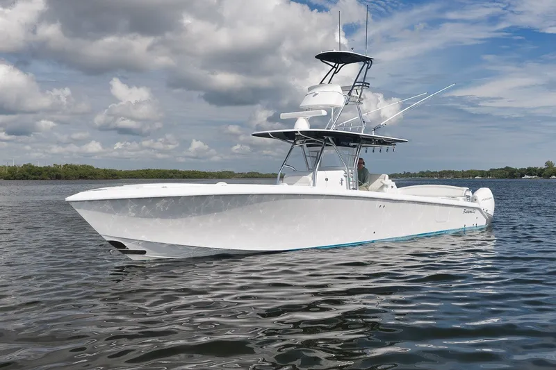 Slide: The Image of 2020 Bahama 41 boat on calm water under cloudy sky. - 11