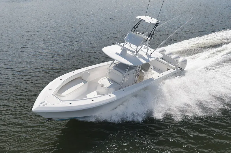 Slide: The Image of 2020 Bahama 41 boat cruising on open water, showcasing sleek design and powerful performance. - 20