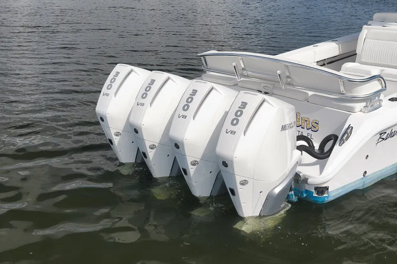 Slide: The Image of Four Mercury 300 V8 engines on a 2020 Bahama 41 boat in water. - 32