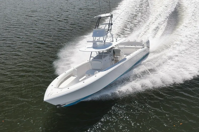 Slide: The Image of 2020 Bahama 41 boat cruising swiftly on open water. - 21