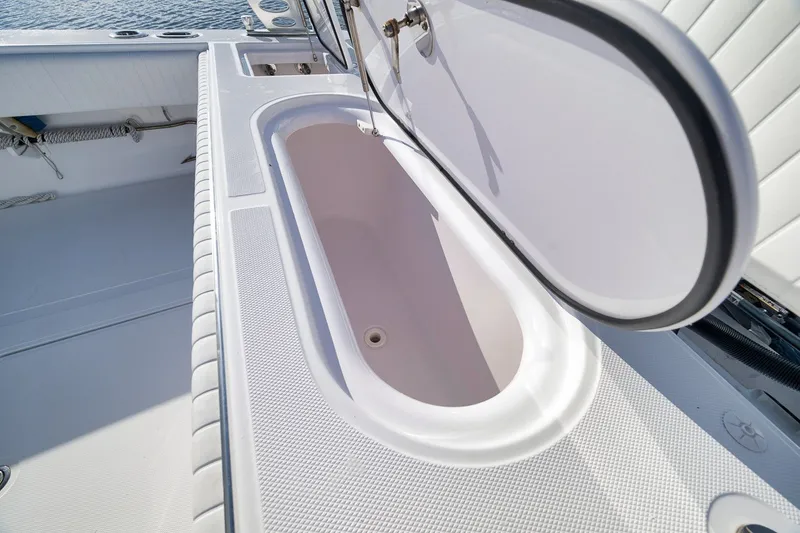 Slide: The Image of Open storage compartment on 2020 Bahama 41 boat, showcasing sleek design and functionality. - 41